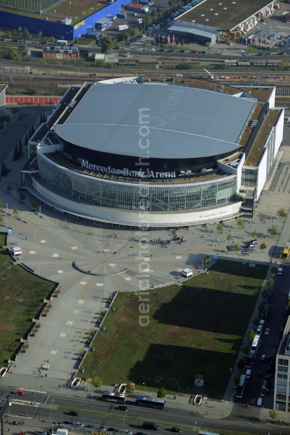 Aerial image Berlin - Mercedes-Benz-Arena on the Spree riverbank in the Friedrichshain part of Berlin. The former O2 World - now Mercedes-Benz-Arena - is located in the Anschutz Areal, a business and office space on the riverbank