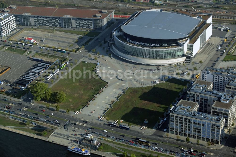 Berlin from above - Mercedes-Benz-Arena on the Spree riverbank in the Friedrichshain part of Berlin. The former O2 World - now Mercedes-Benz-Arena - is located in the Anschutz Areal, a business and office space on the riverbank