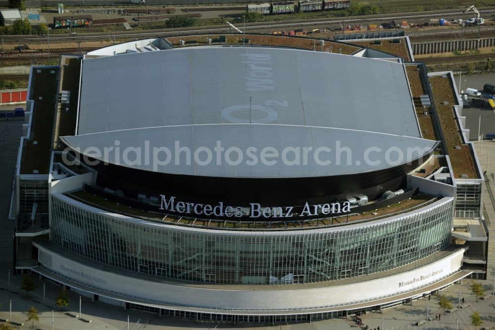 Berlin from above - Mercedes-Benz-Arena on the Spree riverbank in the Friedrichshain part of Berlin. The former O2 World - now Mercedes-Benz-Arena - is located in the Anschutz Areal, a business and office space on the riverbank