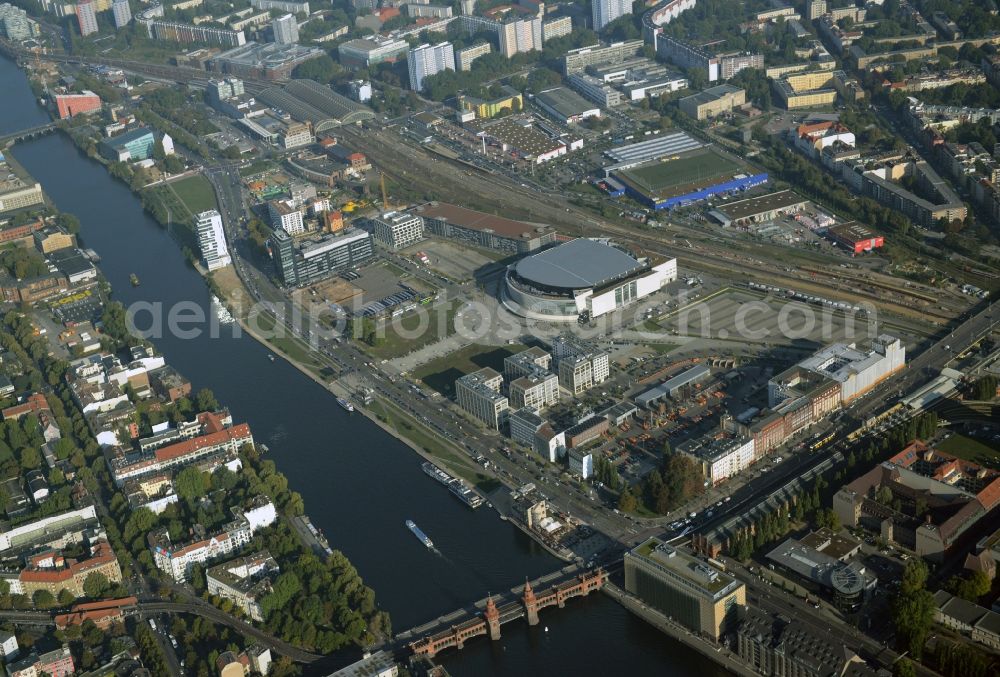 Berlin from above - Mercedes-Benz-Arena on the Spree riverbank in the Friedrichshain part of Berlin. The former O2 World - now Mercedes-Benz-Arena - is located in the Anschutz Areal, a business and office space on the riverbank