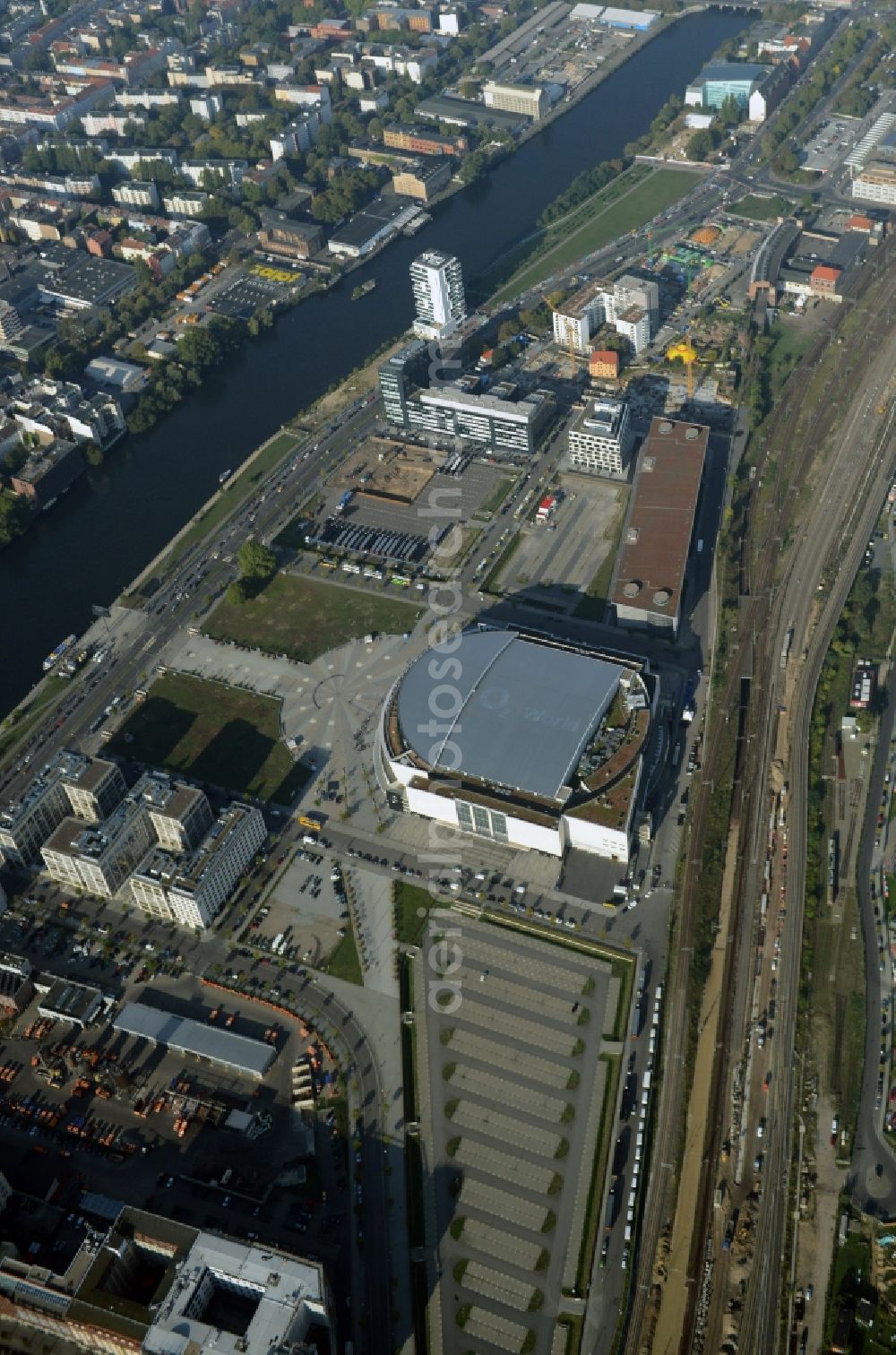 Berlin from above - Mercedes-Benz-Arena on the Spree riverbank in the Friedrichshain part of Berlin. The former O2 World - now Mercedes-Benz-Arena - is located in the Anschutz Areal, a business and office space on the riverbank