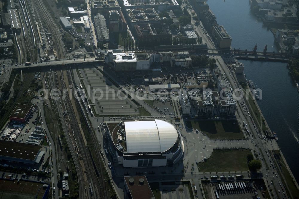 Berlin from above - Mercedes-Benz-Arena on the Spree riverbank in the Friedrichshain part of Berlin. The former O2 World - now Mercedes-Benz-Arena - is located in the Anschutz Areal, a business and office space on the riverbank