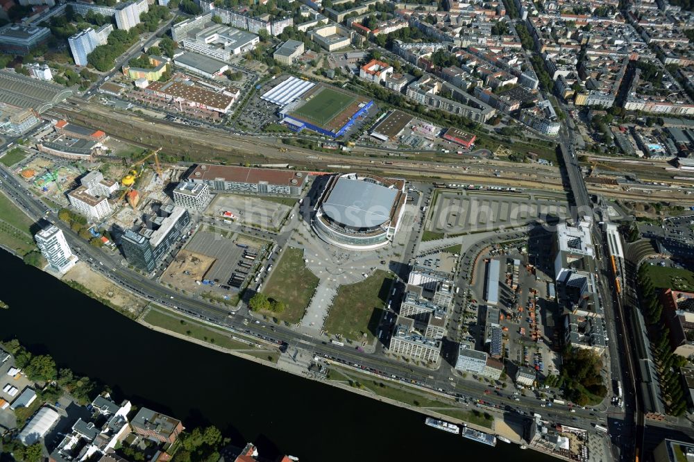 Berlin from above - Mercedes-Benz-Arena on the Spree riverbank in the Friedrichshain part of Berlin. The former O2 World - now Mercedes-Benz-Arena - is located in the Anschutz Areal, a business and office space on the riverbank