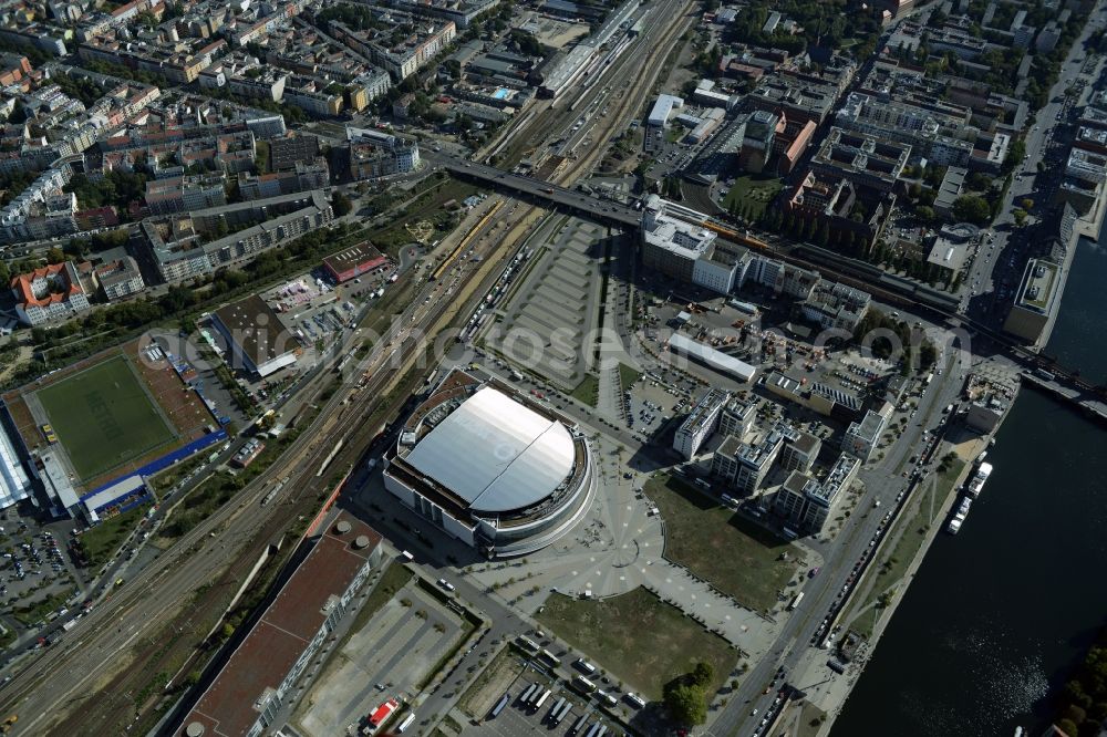 Berlin from above - Mercedes-Benz-Arena on the Spree riverbank in the Friedrichshain part of Berlin. The former O2 World - now Mercedes-Benz-Arena - is located in the Anschutz Areal, a business and office space on the riverbank