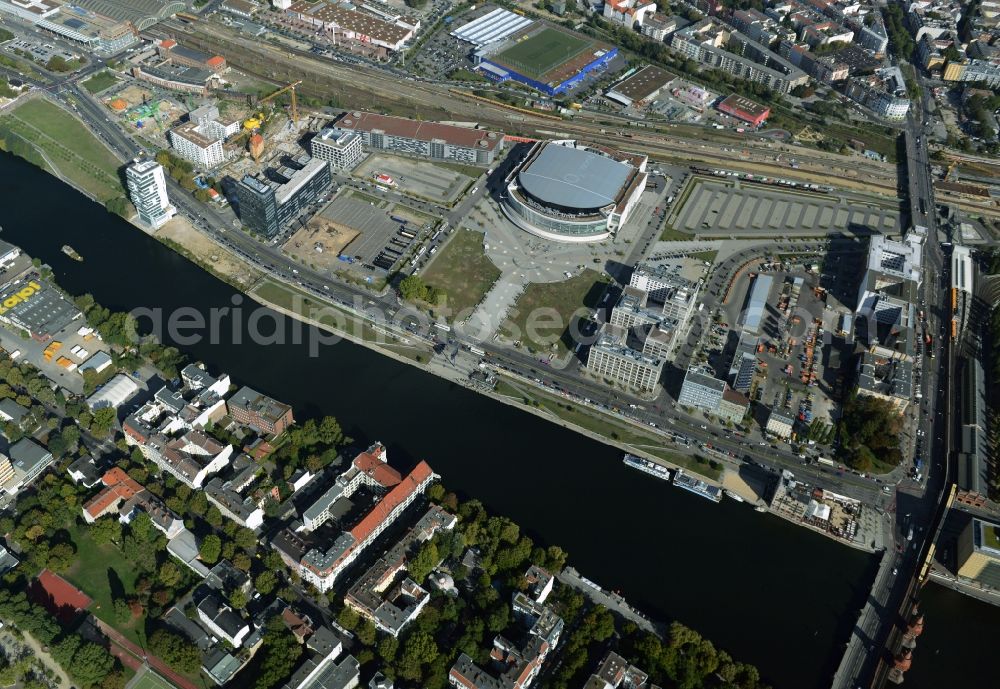 Berlin from above - Mercedes-Benz-Arena on the Spree riverbank in the Friedrichshain part of Berlin. The former O2 World - now Mercedes-Benz-Arena - is located in the Anschutz Areal, a business and office space on the riverbank