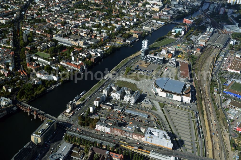 Berlin from above - Mercedes-Benz-Arena on the Spree riverbank in the Friedrichshain part of Berlin. The former O2 World - now Mercedes-Benz-Arena - is located in the Anschutz Areal, a business and office space on the riverbank