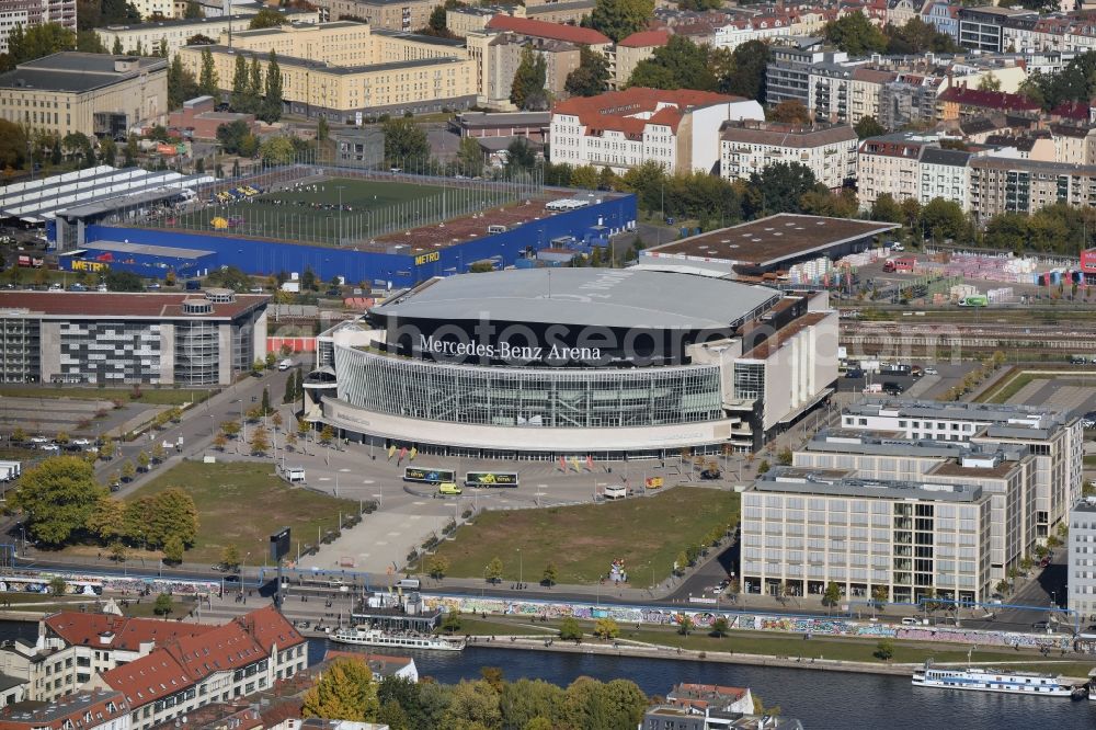 Berlin from above - Mercedes-Benz-Arena on the Spree riverbank in the Friedrichshain part of Berlin. The former O2 World - now Mercedes-Benz-Arena - is located in the Anschutz Areal, a business and office space on the riverbank