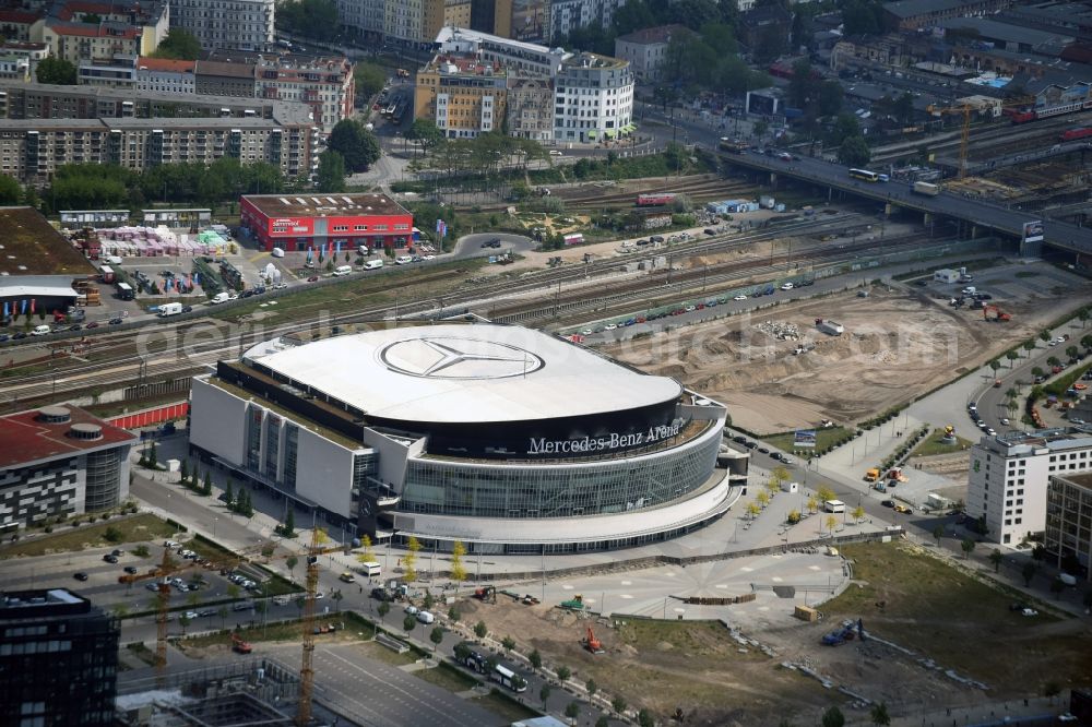 Berlin from above - Mercedes-Benz-Arena on the Spree riverbank in the Friedrichshain part of Berlin. The former O2 World - now Mercedes-Benz-Arena - is located in the Anschutz Areal, a business and office space on the riverbank