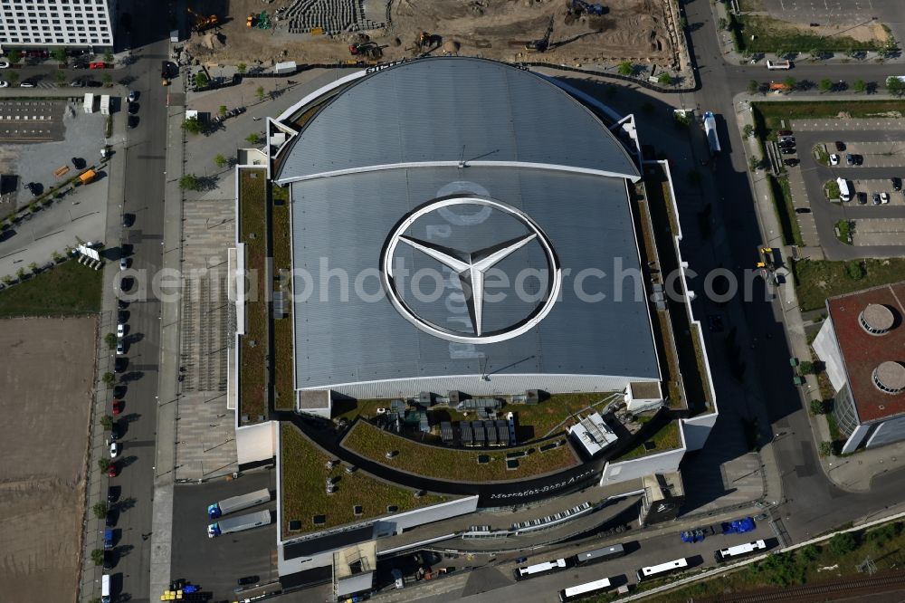 Aerial image Berlin - Mercedes-Benz-Arena on the Spree riverbank in the Friedrichshain part of Berlin. The former O2 World - now Mercedes-Benz-Arena - is located in the Anschutz Areal, a business and office space on the riverbank