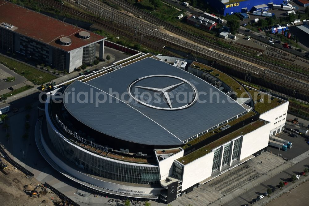 Berlin from above - Mercedes-Benz-Arena on the Spree riverbank in the Friedrichshain part of Berlin. The former O2 World - now Mercedes-Benz-Arena - is located in the Anschutz Areal, a business and office space on the riverbank