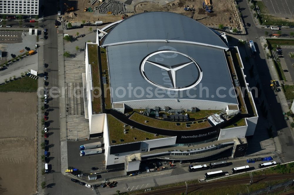 Berlin from above - Mercedes-Benz-Arena on the Spree riverbank in the Friedrichshain part of Berlin. The former O2 World - now Mercedes-Benz-Arena - is located in the Anschutz Areal, a business and office space on the riverbank