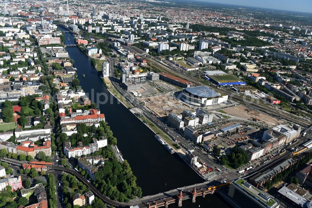 Berlin from the bird's eye view: Mercedes-Benz-Arena on the Spree riverbank in the Friedrichshain part of Berlin. The former O2 World - now Mercedes-Benz-Arena - is located in the Anschutz Areal, a business and office space on the riverbank