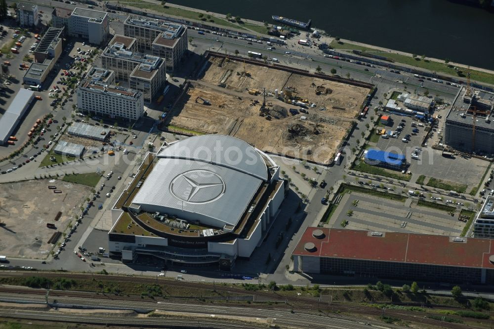 Berlin from above - Mercedes-Benz-Arena on the Spree riverbank in the Friedrichshain part of Berlin. The former O2 World - now Mercedes-Benz-Arena - is located in the Anschutz Areal, a business and office space on the riverbank