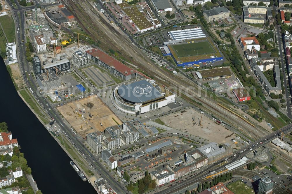 Berlin from the bird's eye view: Mercedes-Benz-Arena on the Spree riverbank in the Friedrichshain part of Berlin. The former O2 World - now Mercedes-Benz-Arena - is located in the Anschutz Areal, a business and office space on the riverbank