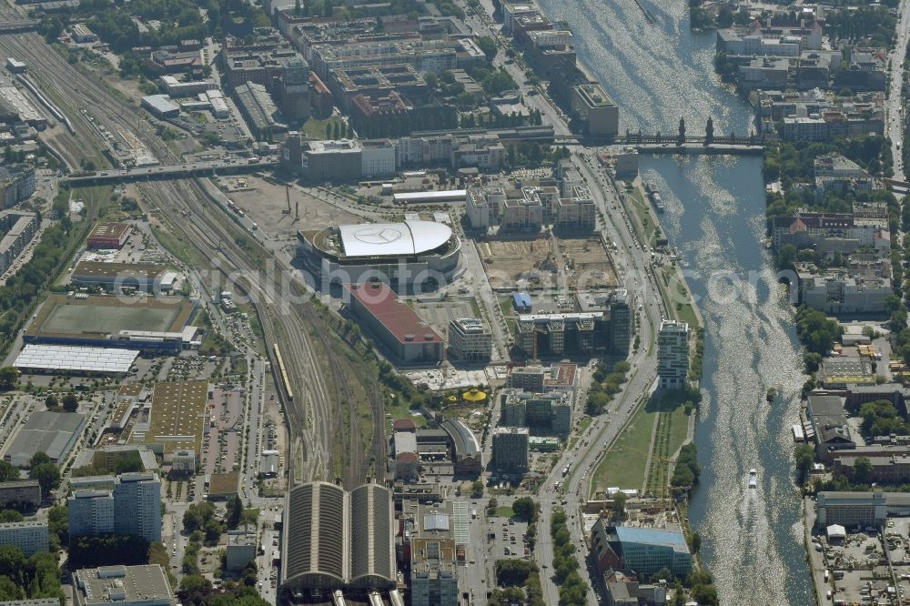 Aerial image Berlin - Mercedes-Benz-Arena on the Spree riverbank in the Friedrichshain part of Berlin. The former O2 World - now Mercedes-Benz-Arena - is located in the Anschutz Areal, a business and office space on the riverbank