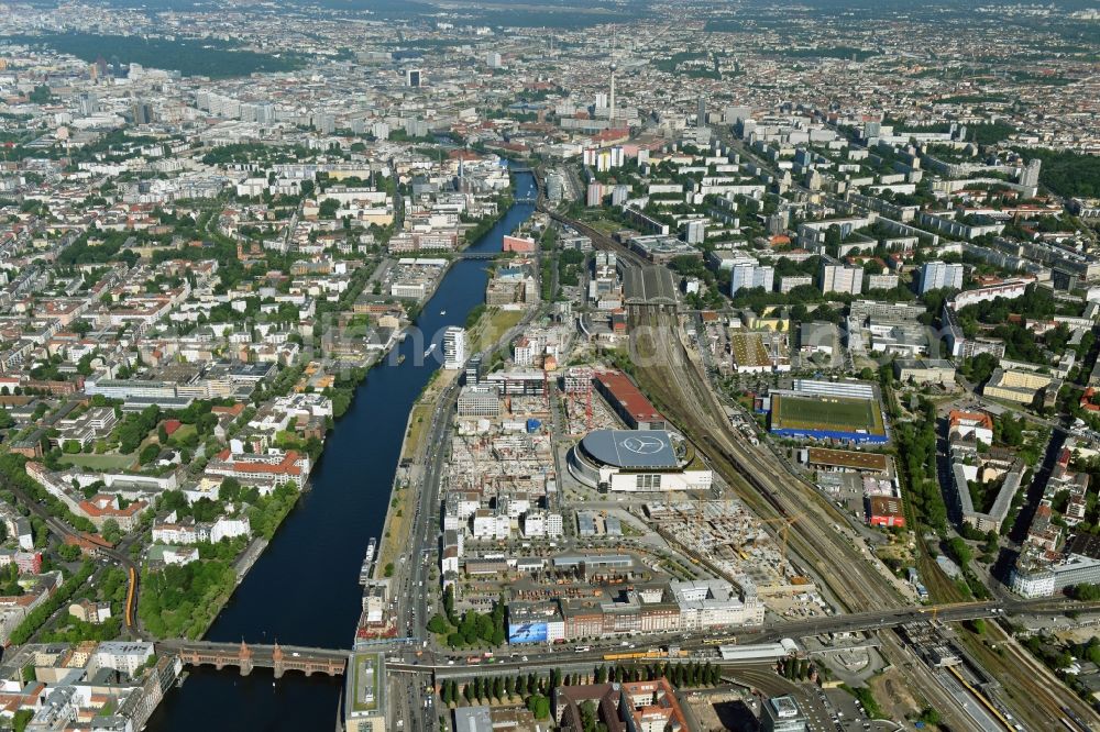 Aerial image Berlin - Night view of Mercedes-Benz-Arena on the Spree riverbank in the Friedrichshain part of Berlin. The former O2 World - now Mercedes-Benz-Arena - is located in the Anschutz Areal, a business and office space on the riverbank