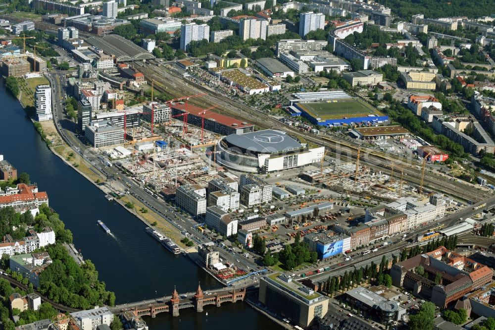 Aerial image Berlin - Night view of Mercedes-Benz-Arena on the Spree riverbank in the Friedrichshain part of Berlin. The former O2 World - now Mercedes-Benz-Arena - is located in the Anschutz Areal, a business and office space on the riverbank