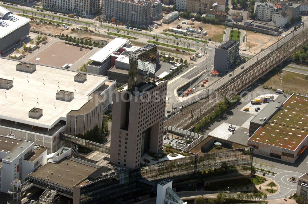 Aerial photograph Frankfurt - Blick auf das Messe Torhaus. Das Hochhaus wurde 1984 erbaut und teilt das Messegelände in einen östlichen und einen westlichen Geländeteil. Der Architekt Oswald Mathias Ungers stellte damit plastisch die Bestimmung des Torhauses als „Tor zu Frankfurt“ dar. Beteiligte Firmen Grandjean & Kollegen Vermessungsingenieure, Pettersson & Ahrens Ingenieur-Planung GmbH, Messe Frankfurt GmbH, HOCHTIEF Projektentwicklung GmbH, CDM Consult GmbH.