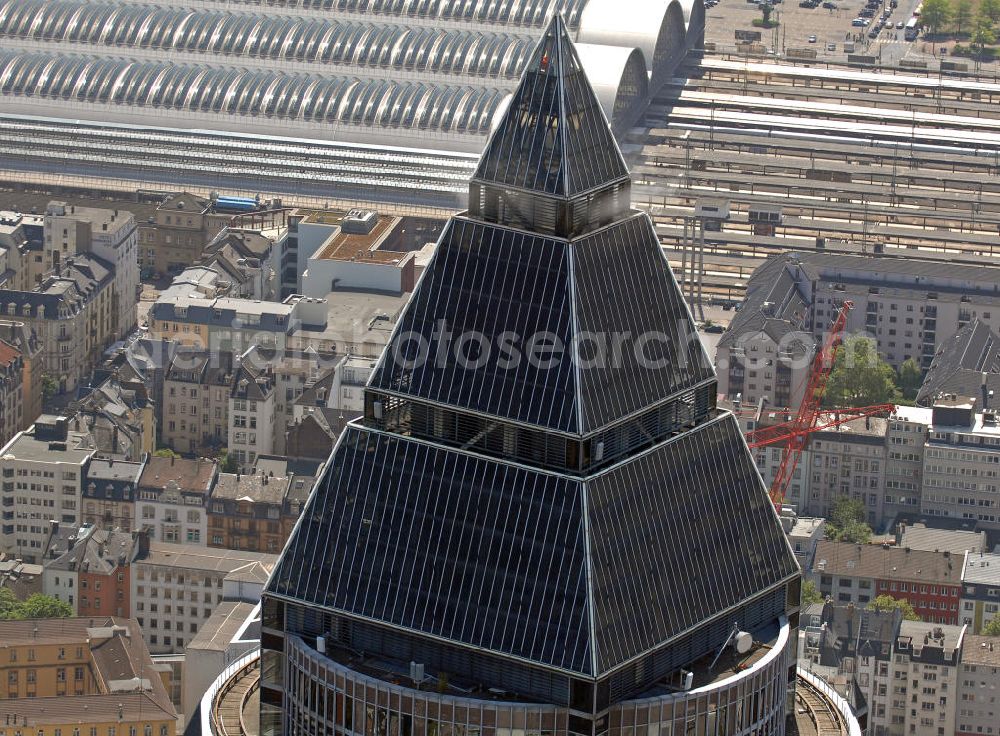 Aerial photograph Frankfurt am Main - Blick auf den Messeturm in Frankfurt. Er hat eine Höhe von 257 m mit 55 Etagen und war bei seinem Bau 1991 das höchste Gebäude Europas. Die Pyramide auf dem Dach ist 36,6 m hoch. View on the Fair Tower in Frankfurt. It has a height of 257 meters with 55 floors and was at its construction in 1991, the highest building in Europe. The Pyramid on the roof is 36.6 m high.