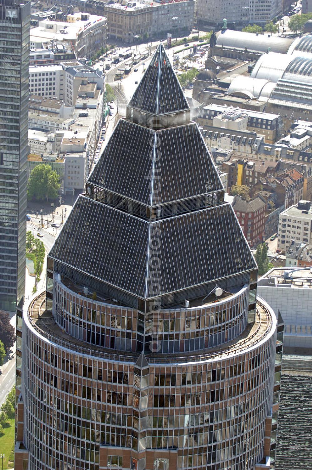 Aerial image Frankfurt am Main - Blick auf den Messeturm in Frankfurt. Er hat eine Höhe von 257 m mit 55 Etagen und war bei seinem Bau 1991 das höchste Gebäude Europas. Die Pyramide auf dem Dach ist 36,6 m hoch. View on the Fair Tower in Frankfurt. It has a height of 257 meters with 55 floors and was at its construction in 1991, the highest building in Europe. The Pyramid on the roof is 36.6 m high.