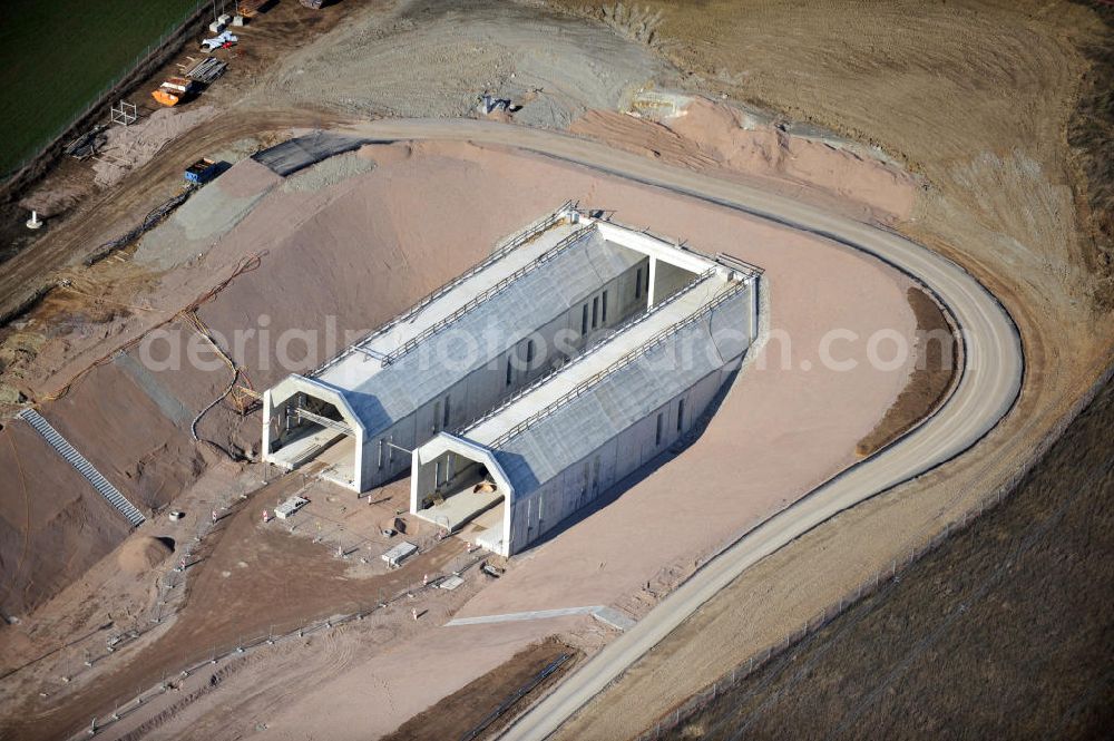 Aerial image Bad Bibra - View of the construction works at Bibra tunnel, a tunnel construction project by the Marti AG. The railway tunnel is created as a part of the German Unity Transport Project (VDE) No. 8. The building is created by spraying concrete with the inner shell in-situ concrete. The length of the two tunnels of the railway tracks will be 6466 meters. Client is the DB InfraGO AG