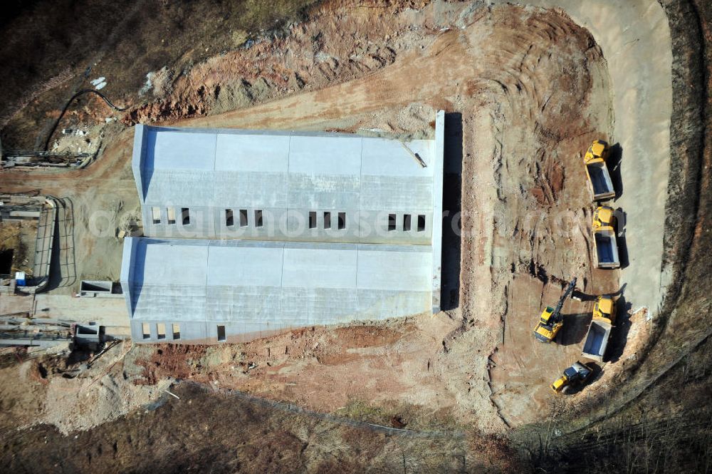 Aerial photograph Bad Bibra - View of the construction works at Bibra tunnel, a tunnel construction project by the Marti AG. The railway tunnel is created as a part of the German Unity Transport Project (VDE) No. 8. The building is created by spraying concrete with the inner shell in-situ concrete. The length of the two tunnels of the railway tracks will be 6466 meters. Client is the DB InfraGO AG