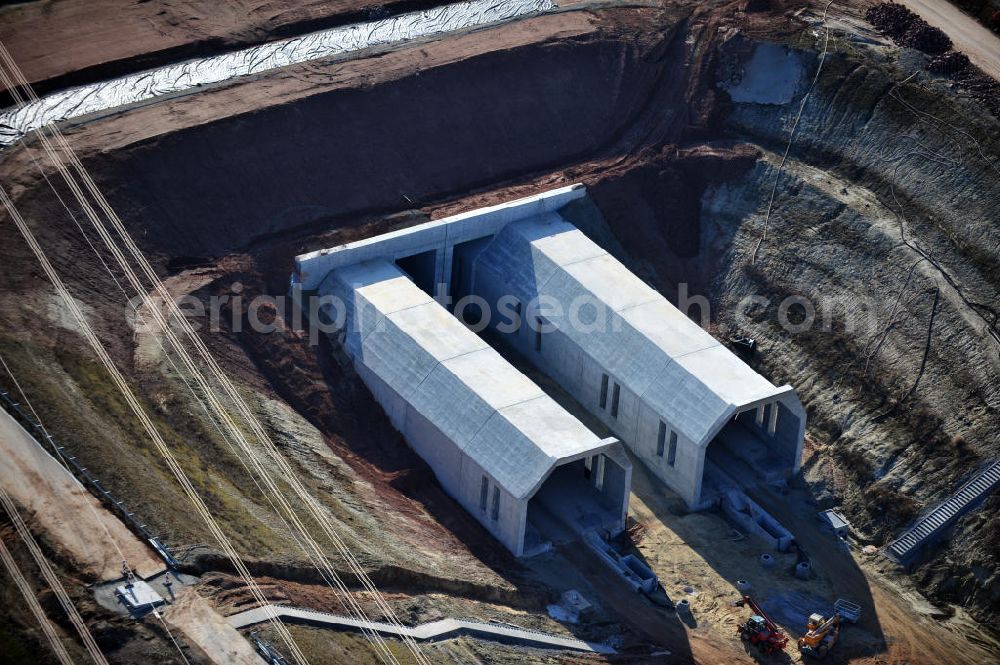 Aerial image Bad Bibra - View of the construction works at Bibra tunnel, a tunnel construction project by the Marti AG. The railway tunnel is created as a part of the German Unity Transport Project (VDE) No. 8. The building is created by spraying concrete with the inner shell in-situ concrete. The length of the two tunnels of the railway tracks will be 6466 meters. Client is the DB InfraGO AG