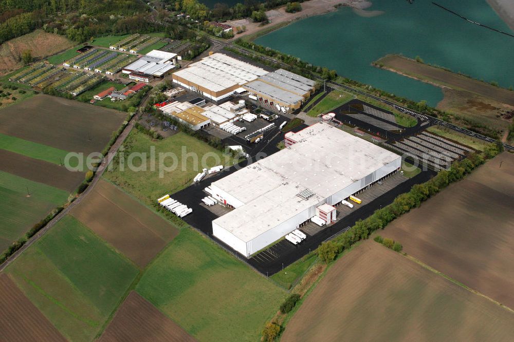 Aerial image Gimbsheim - Blick auf das Gelände der MGL METRO Group Logistics Warehousing GmbH in der Ortsgemeinde Gimbsheim im Landkreis Alzey-Worms in Rheinland-Pfalz. View to the MGL Metro Group Logistics in the congregation Gimbsheim in the administrative district Alzey-Worms of Rhineland-Palatinate.