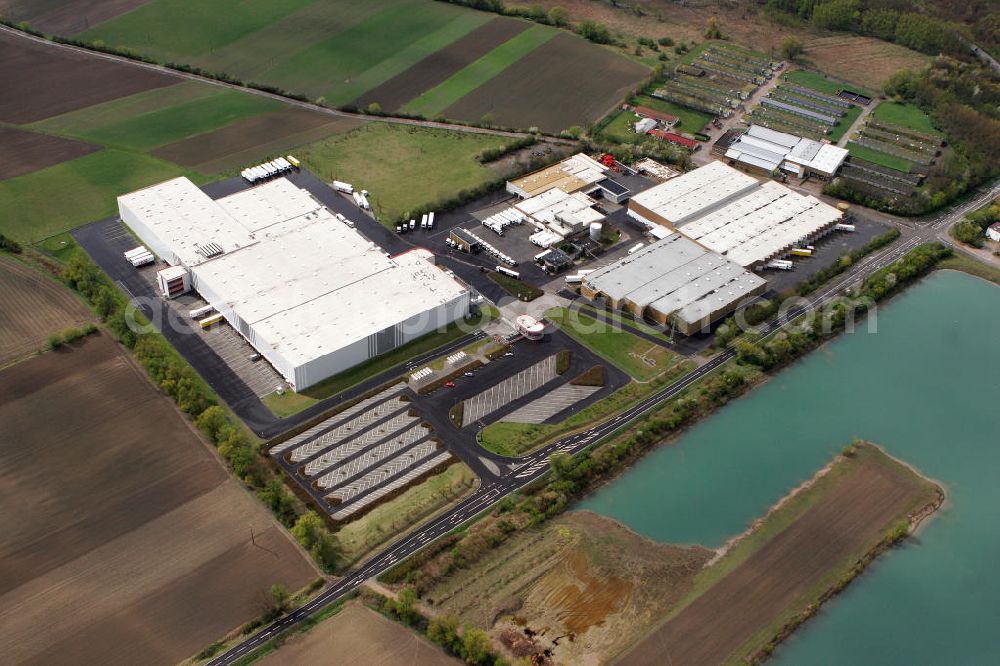 Gimbsheim from above - Blick auf das Gelände der MGL METRO Group Logistics Warehousing GmbH in der Ortsgemeinde Gimbsheim im Landkreis Alzey-Worms in Rheinland-Pfalz. View to the MGL Metro Group Logistics in the congregation Gimbsheim in the administrative district Alzey-Worms of Rhineland-Palatinate.