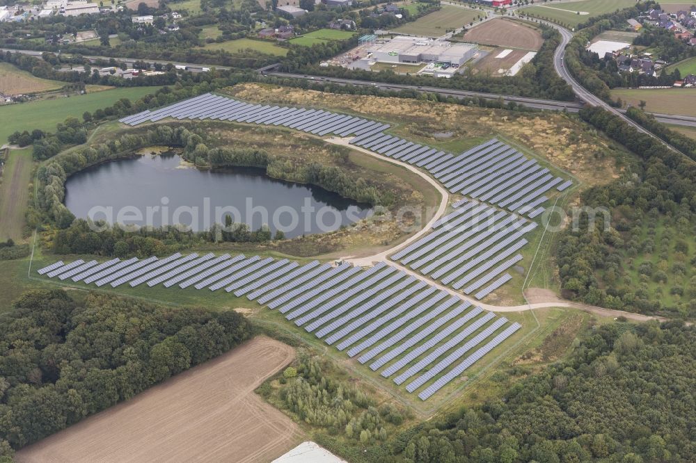 Neukirchen-Vluyn from above - Mill field and lake with photovoltaic system on the road Grafschafter Straße at Neukirchen on the Lower Rhine in North Rhine-Westphalia