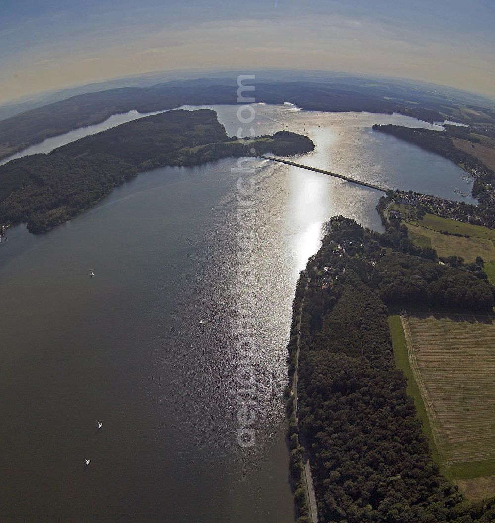 Möhnesee from above - Blick auf den Stausee der Möhnetalsperre während des Hochwassers 2007. Die Talsperre wurde zwischen 1908 und 1913 erbaut und umfasst rund 134,5 Millionen Kubikmeter Wasser. View of reservoir of the Moehne barrage during the flood 2007. The dam was built between 1908 and 1913 and the reservoir comprises approximately 134.5 million cubic meters of water.