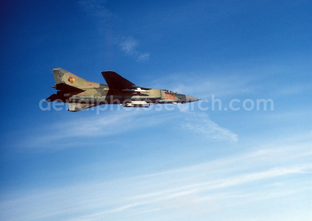 Peenemünde from the bird's eye view: Eine Jagdflugzeug Mig 23 der Luftstreitkräfte der NVA / Nationale Volksarmee über der Ostsee bei Peenemünde.