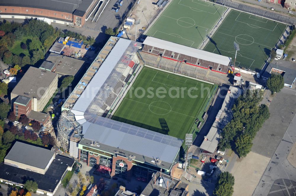 Aerial photograph Hamburg - Blick auf den stufenweisen Um- und Ausbau des Hamburger Millerntor-Stadion / St. Pauli Stadion. Das Stadion ist Heimstätte der 1. und 2. Fußballmannschaft des FC St. Pauli. View of the gradual conversion and expansion work of the Hamburg Millerntor Stadium / St. Pauli stadium. The stadium is home to the first and 2 Soccer team of FC St. Pauli.