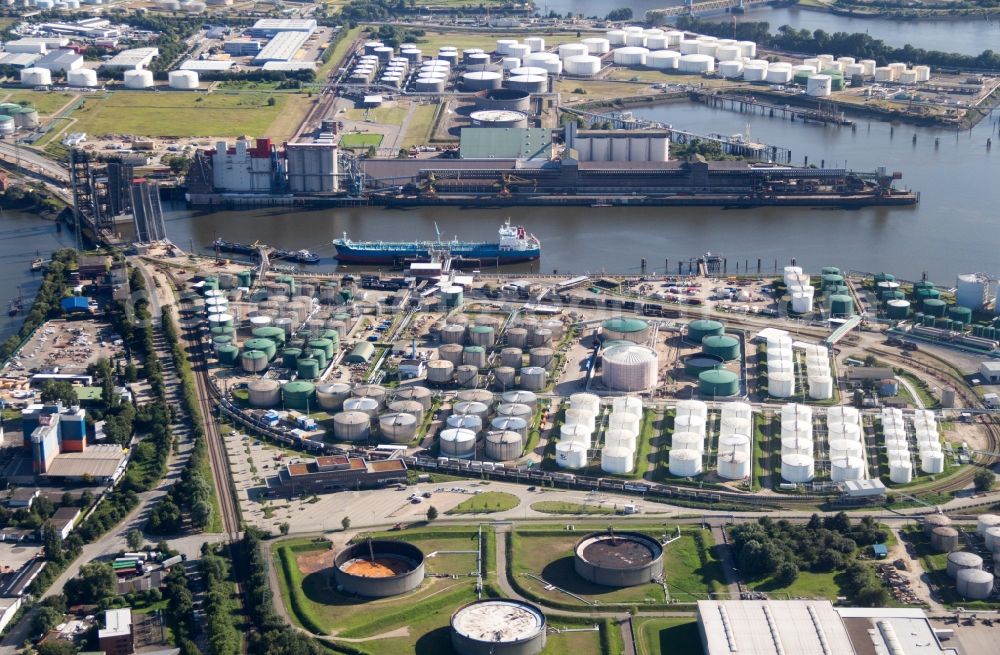 Hamburg from the bird's eye view: Mineral oil - tank at the Neuhoefer Hafen at the Rethe in Hamburg in Germany. On the area there are the companies Oiltanking and Silo P. Kruse Betriebs- GmbH & Co