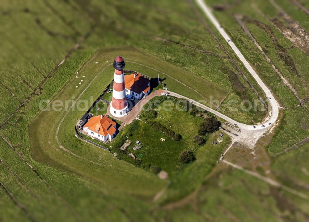 Westerhever from the bird's eye view: Miniature with Tiltshift - lighthouse as a historical navigation sign in the coastal area Westerheversand in the district of Hauert in Westerhever in the federal state Schleswig-Holstein