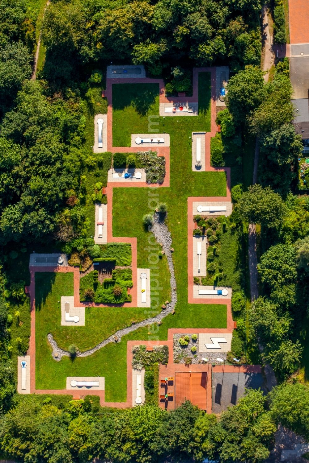 Kirchlengern from the bird's eye view: Mini golf facilities Espelpark in Kirchlengern in the state of North Rhine-Westphalia. The compound is located in the wooded Espelpark in the Southeast of the borough