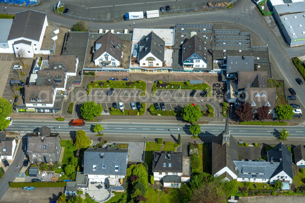 Aerial image Bestwig - Mixing of residential and commercial settlements on street Bundesstrasse - Am Alten Gueterbahnhof in Bestwig at Sauerland in the state North Rhine-Westphalia, Germany