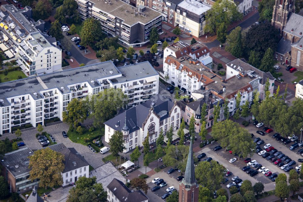 Moers from above - Mixed development of the residential and commercial area on Schwanenring Street in Moers in the state of North Rhine-Westphalia, Germany