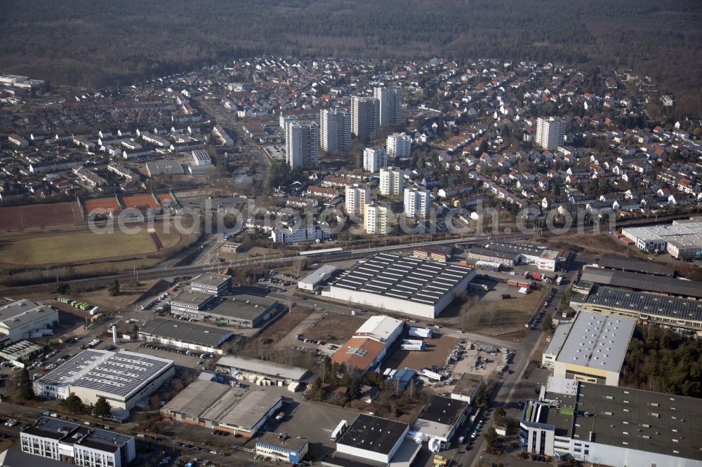 Dietzenbach from the bird's eye view: Mixing of residential and commercial settlements in the district Steinberg in Dietzenbach in the state Hesse. In the center of the image the station Dietzenbach Steinberg of the S-Bahn line S2 of the Deutsche Bahn