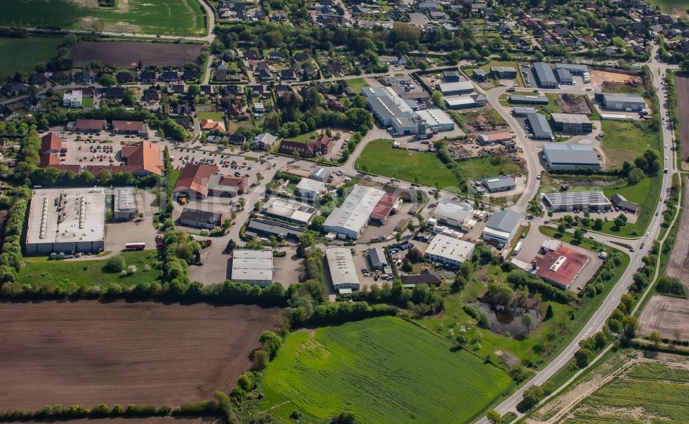 Aerial photograph Wees - Mixing of residential and commercial settlements in Wees in the state Schleswig-Holstein, Germany