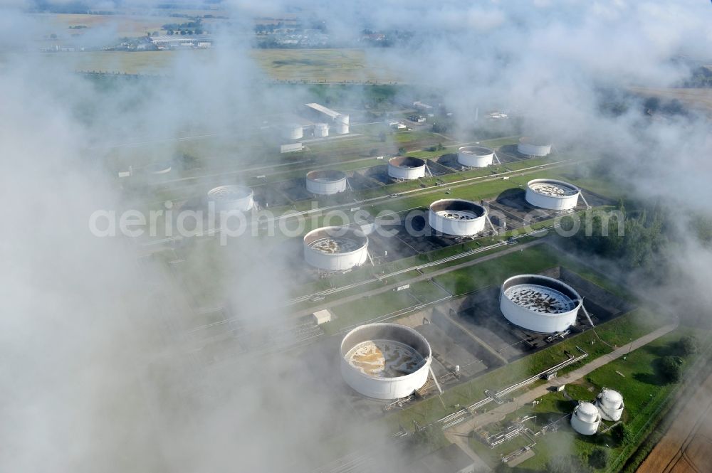 Aerial photograph Seefeld - With morning mist covered fields petroleum tank farm in Seefeld