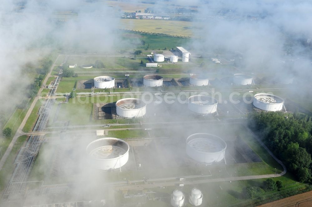 Aerial image Seefeld - With morning mist covered fields petroleum tank farm in Seefeld