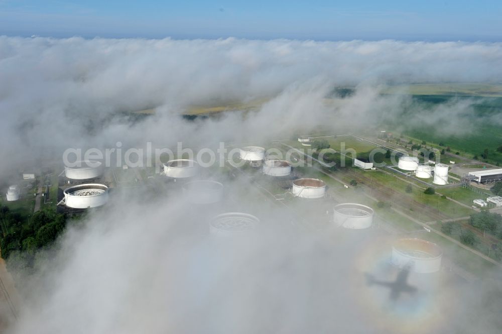 Aerial photograph Seefeld - With morning mist covered fields petroleum tank farm in Seefeld