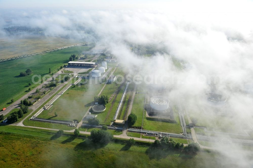 Aerial image Seefeld - With morning mist covered fields petroleum tank farm in Seefeld