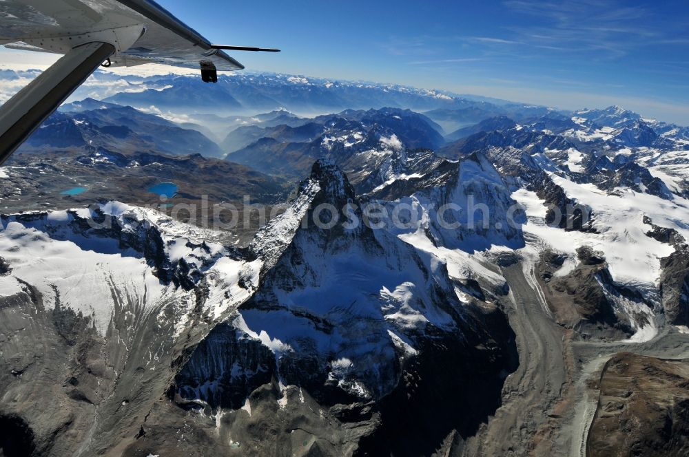 Aerial photograph Zermatt - With snow-capped mountain - summit of the Matterhorn mountain in the Alps near Zermatt in Switzerland