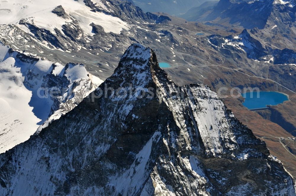 Aerial image Zermatt - With snow-capped mountain - summit of the Matterhorn mountain in the Alps near Zermatt in Switzerland