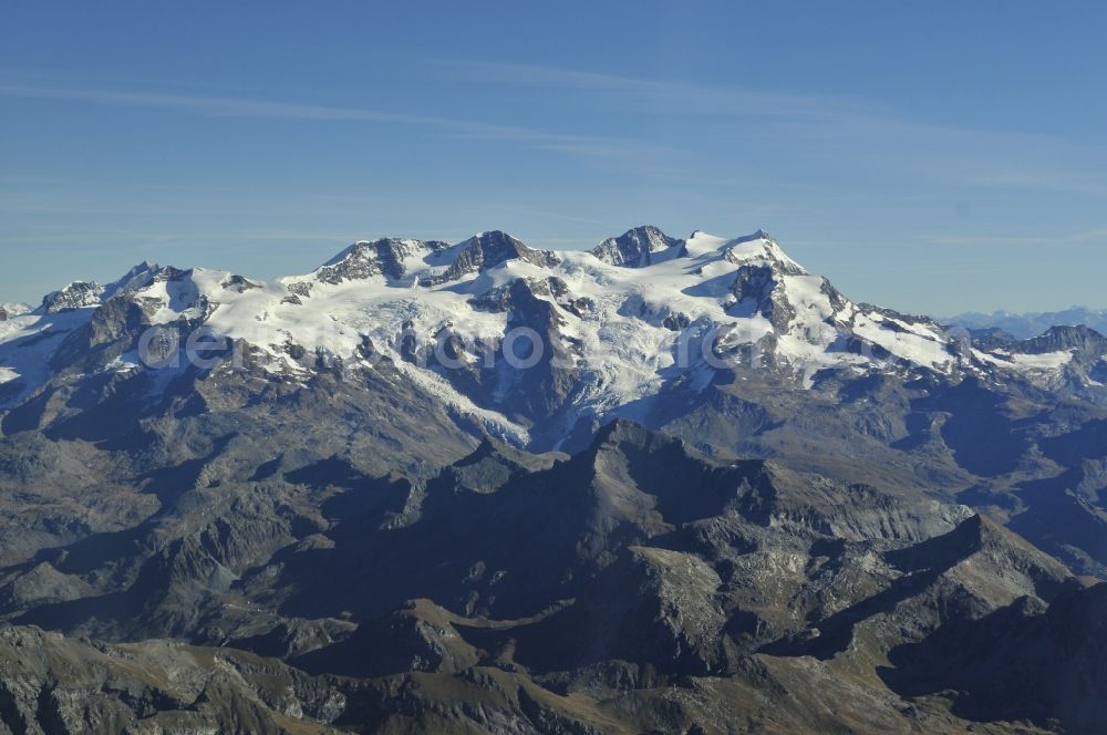 Wallis from above - With snow-capped mountain - summit of Mont Blanc, the highest mountain in the mountains of the Alps in the triangle in Valais in Switzerland