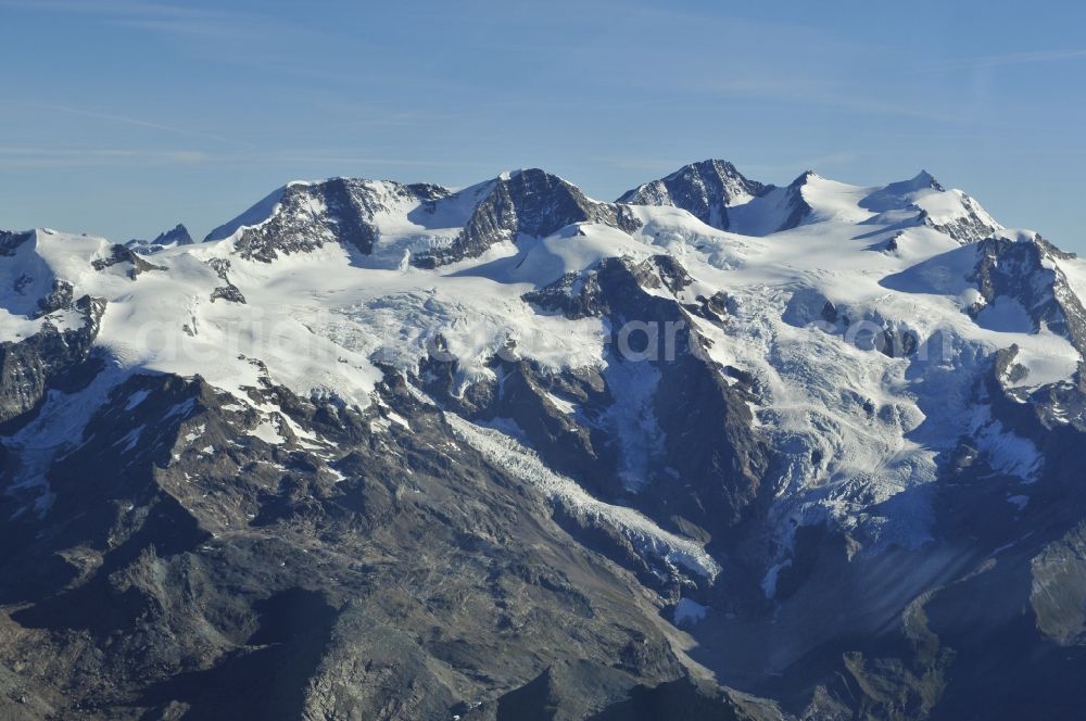 Wallis from the bird's eye view: With snow-capped mountain - summit of Mont Blanc, the highest mountain in the mountains of the Alps in the triangle in Valais in Switzerland