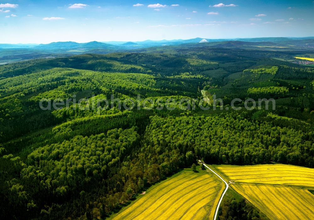 Aerial photograph Bermbach - Forest and mountain landscape of the mid-mountain range Thueringische Rhoen in Bermbach in the state Thuringia, Germany