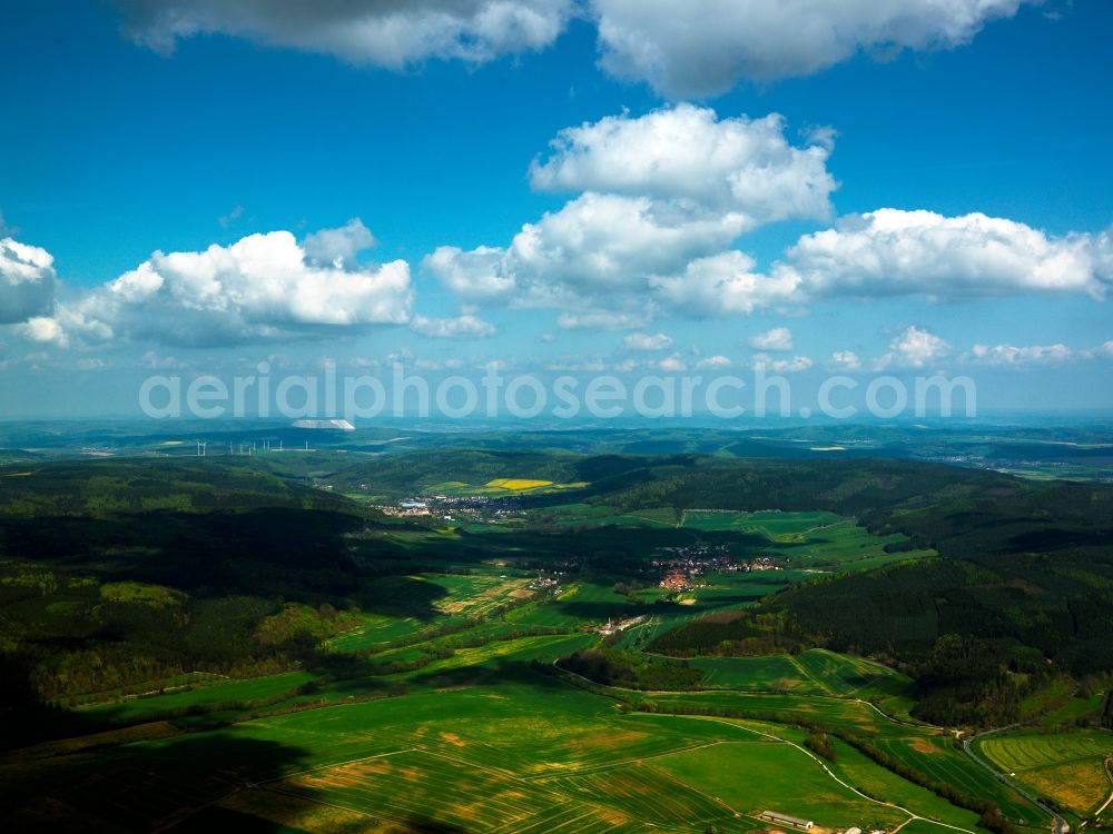 Bermbach from the bird's eye view: Forest and mountain landscape of the mid-mountain range Thueringische Rhoen in Bermbach in the state Thuringia, Germany